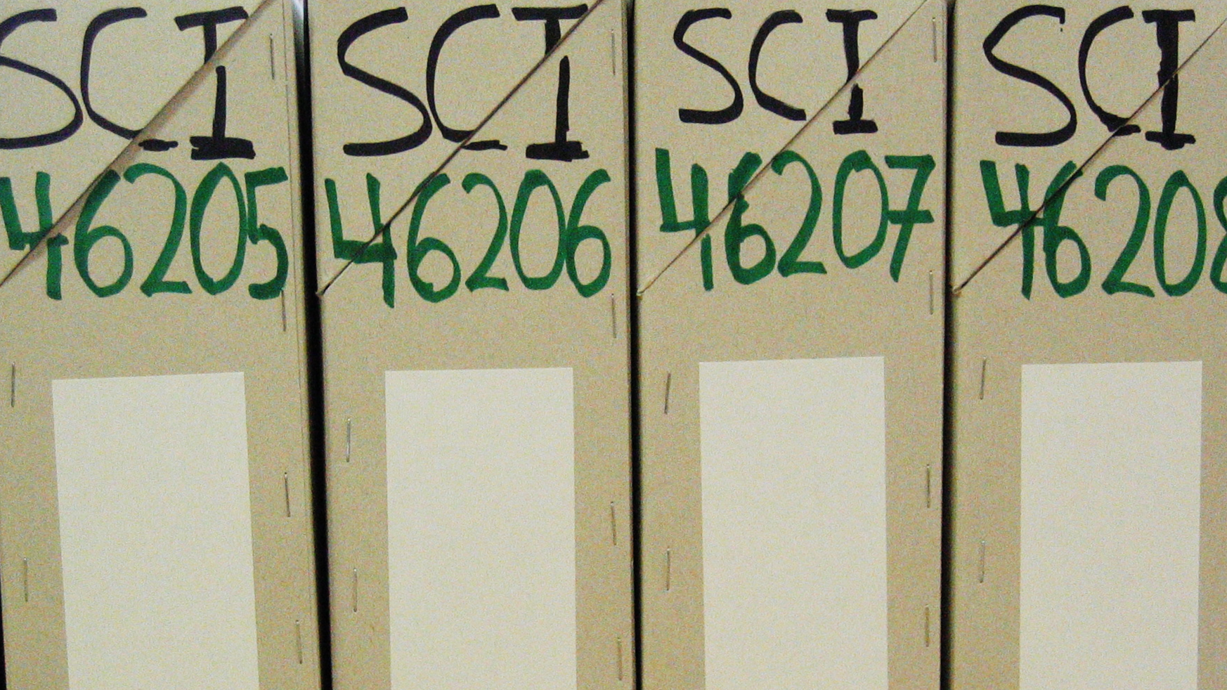 Front of Archives boxes of SCI International Archives